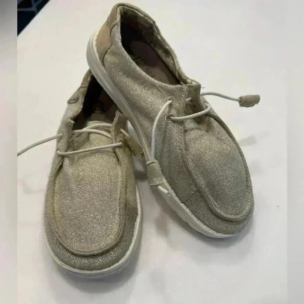 Hey dude women’s sneakers gold with a slight shimmer  size 6